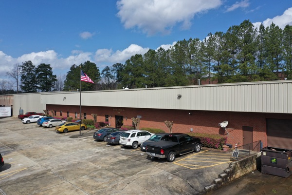 Flagpole Installation in West Michigan 3 Aerial view of the FlagCo manufacturing facility in Acworth, Georgia, with an American flag flying out front
